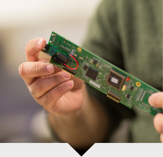 Person holding a mother board